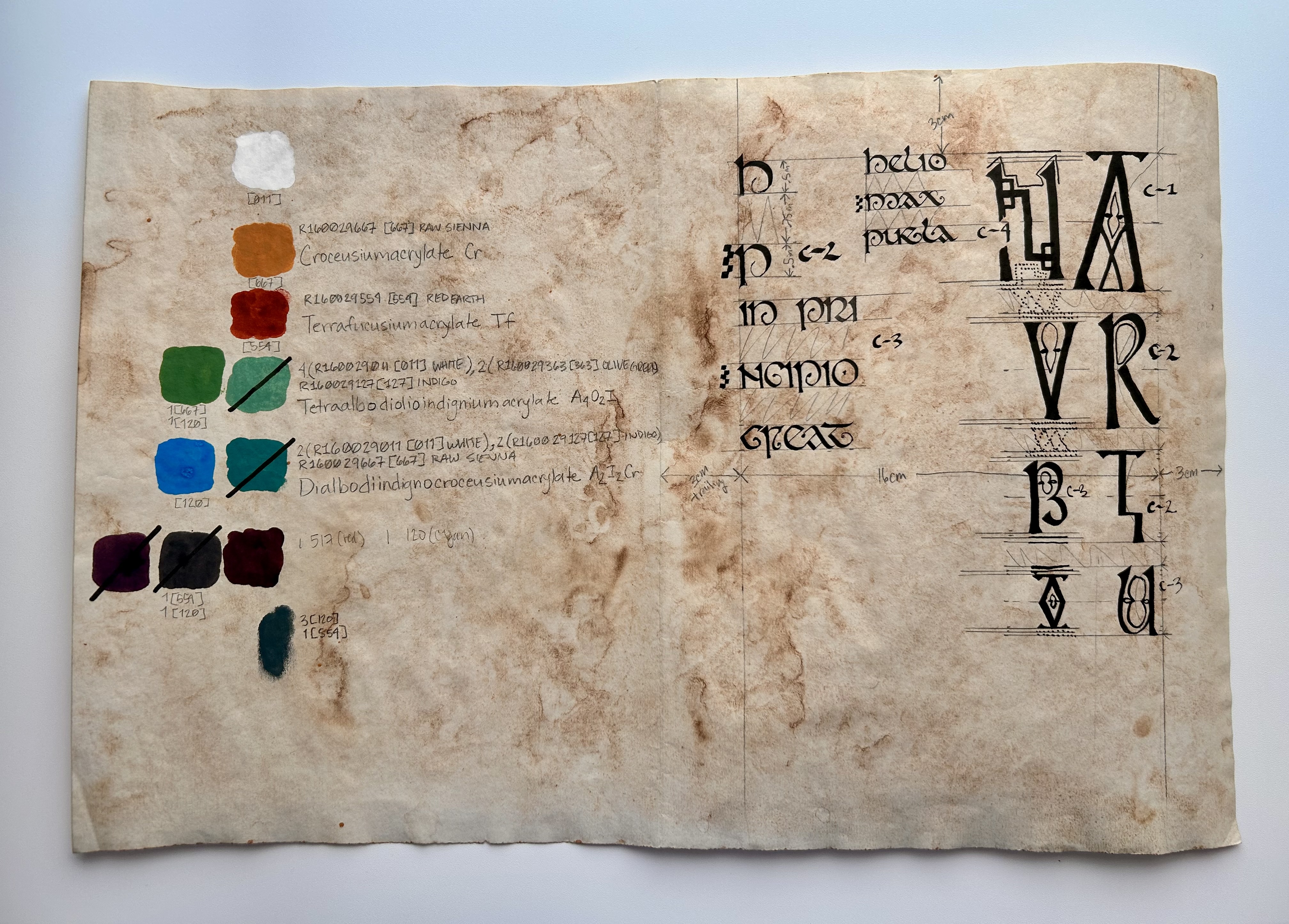 Experimental ink and color samples, calligraphic lettering, and an early artist's seal on aged paper