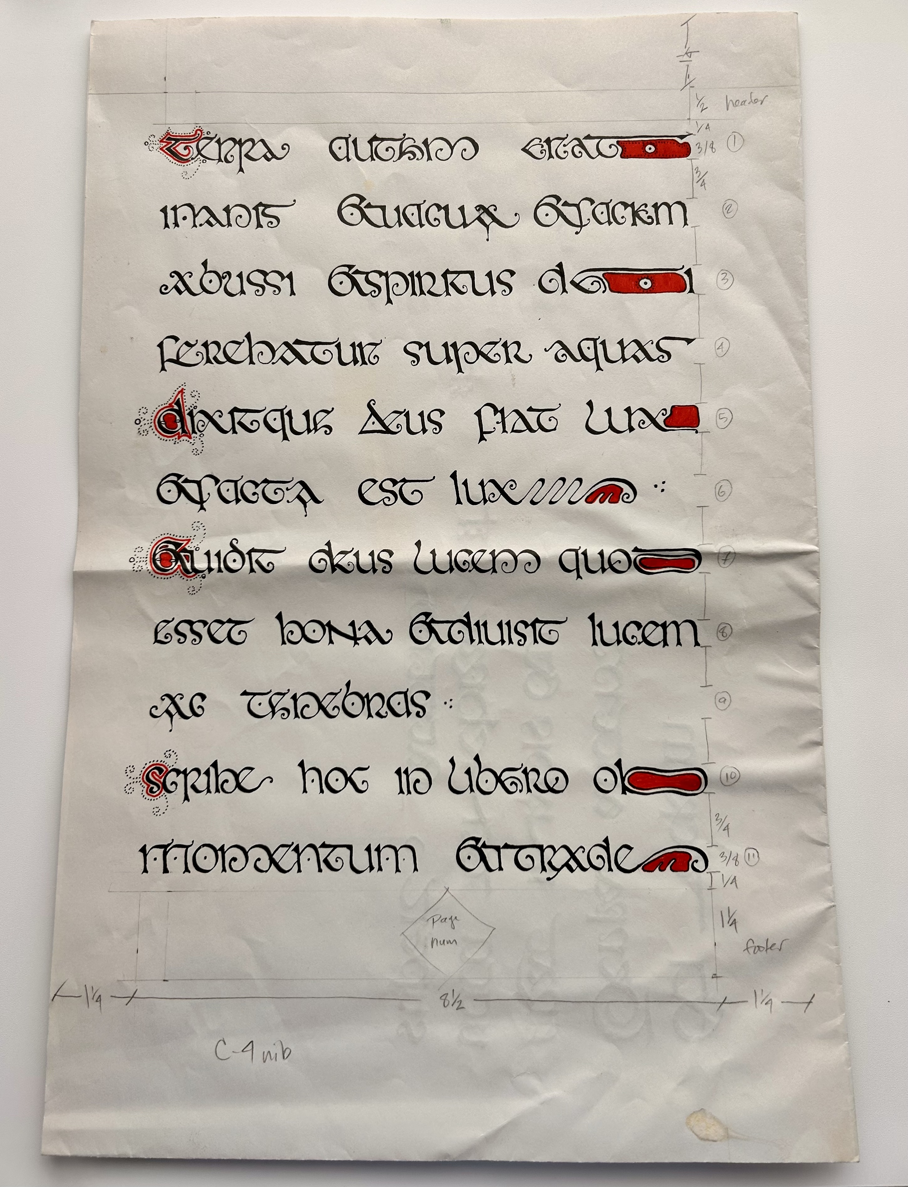 Second manuscript layout study featuring Latin calligraphy, red accents, and pencil guidelines